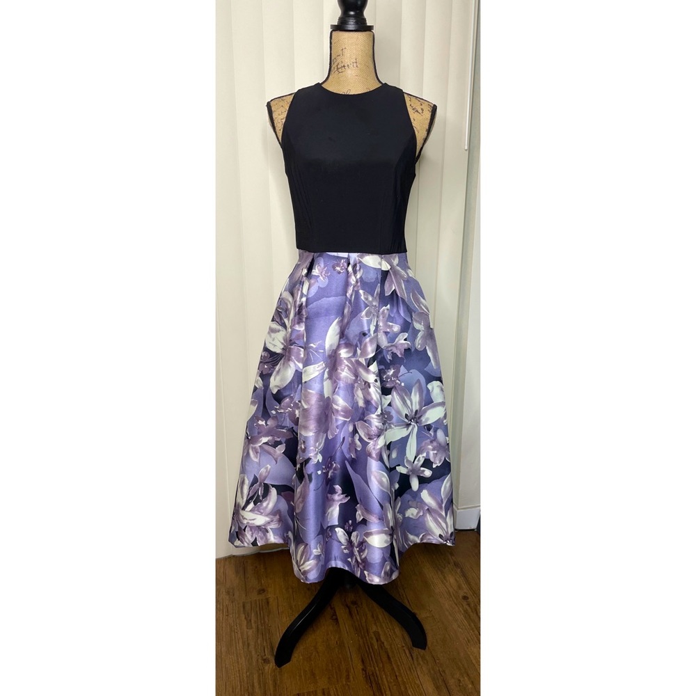 SLNY New York! New dress with high low skirt. Size 4.